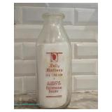 Richmond Dairy glass milk bottle with Dolly Madison Ice Cream branding