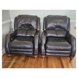 Two brown leather recliners with nailhead trim by Haining High Point Furniture Co., Ltd; measures 33