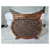  Woven bamboo chest with curved top and latch closure; measures 21.5" x 21" x 14"
