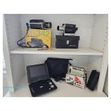 Vintage camera and portable electronics grouping with Kodak XL342 movie camera, Kodak XL342 box and 