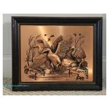 John Lowe signed copper relief of ducks in flight with dark wood frame; measures 16.5" x 13.5" 