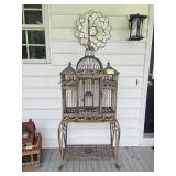  Decorative cast iron birdcage with intricate scrollwork and stand; measures 29" x 70" 1"/2" x 15"