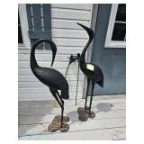  Two metal crane sculptures with detailed feather patterns, one has been repaired, and with two meta