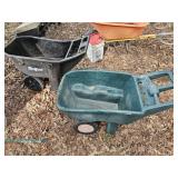 Two plastic garden carts with dual wheels