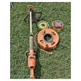  Black & Decker electric string trimmer with additional spools. 