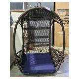 Wicker hanging chair with blue cushion; measures 30" x 44"½ x 22"