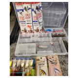 Tackle Logic fishing tackle bag with assorted lead weights, large amount of fishing accessories, and