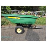 John Deere green plastic utility cart with black metal frame and yellow wheels; measures 64" x 27" x