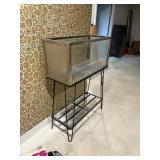 Fish tank with hairpin leg stand