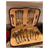 Silverware in unique case Mid C