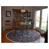 Glass top table and metal chairs