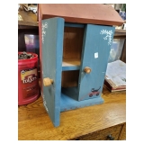 Storage cabinet house