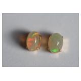 OPAL EARRINGS 18K GOLD NATURAL ETHIOPIAN O1.2ct  https://www.liveauctioneers.com/item/147048329_opal