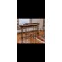 2 side glass top tables with wood trim and metal