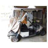 1995 EZGO gold cart with soft sides. Still runs great, well maintained and reconditioned. 2 seater. 