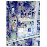 High altitude aerial view of the property