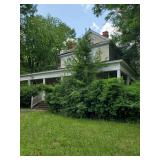 1910 house with lots inside and outside 