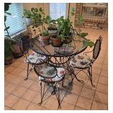 Vintage Black Wrought Iron Mesh Scroll Patio Set with a Round Table and Four Chairs