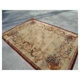 rust and beige floral rug
