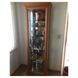 display cabinet and unique glassware and dishes
