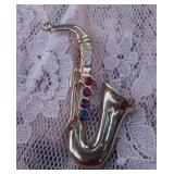 Vintage Gold Tone & Rhinestone Saxophone Brooch