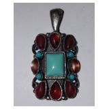 Turquoise and Red Silvertone Pendant