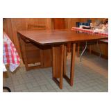 Each side is 2ft. Each leaf is 12"