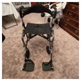 Rollator w/ detachable feet rests