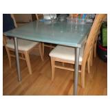 This is a very cool - Pop up expandable Glass top dining table