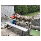 Resin picnic table, chair cushions 