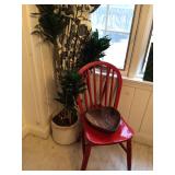 Red chair, plant 