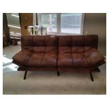 Padded futon with full fold down capability