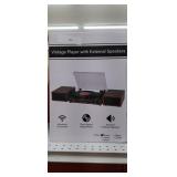 Vintage record player with external speakers 