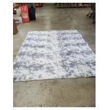 Ophanie fluffy area rug
