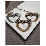 Hanging horseshoe hearts