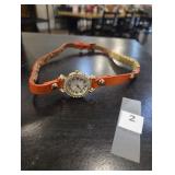 Watch with orange band