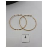 Large decorative gold earrings