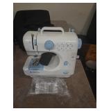  Previous Next Lot - 62 Mini sewing machine