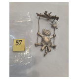 Cat on a swing pin