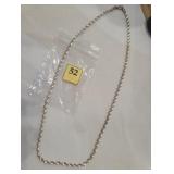 Silver neck chain with a twist