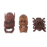 Lot 338 Group of Tibetan and Dayak Wood Carved Masks