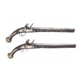 Lot 129 Brace of Ornate Silver & Carved Stock Cavalry Pistols, 18th c.