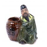 Lot 346 Chinese Porcelain Man w Import Vessel Statue