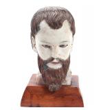 Lot 234 Late 19th to Early 20th Century, Wood Carved Santo Head