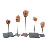 Lot 551 Group of Five Terracotta Heads on Custom Stands
