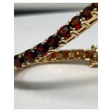 8 GarnetSetinGoldenOverlay725inBracelet