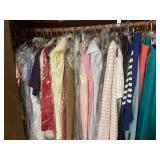 Closet Packed with Designer Women’s Clothes