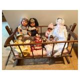 Vintage Doll Cradle Filled with Old Dolls