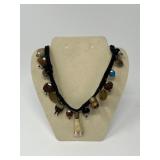 Handcrafted Mixed‑Material Necklace with Animal Tooth Pendant