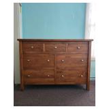 Warm‑Tone Wooden Dresser with Metal Knob Hardware